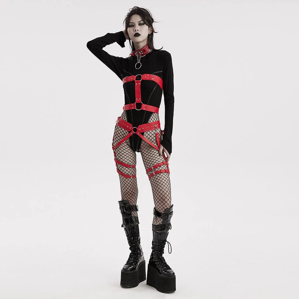 Gothic women's garter belt thigh harness in black faux leather with multiple adjustable straps around the waist and thighs, styled over black mesh tights.