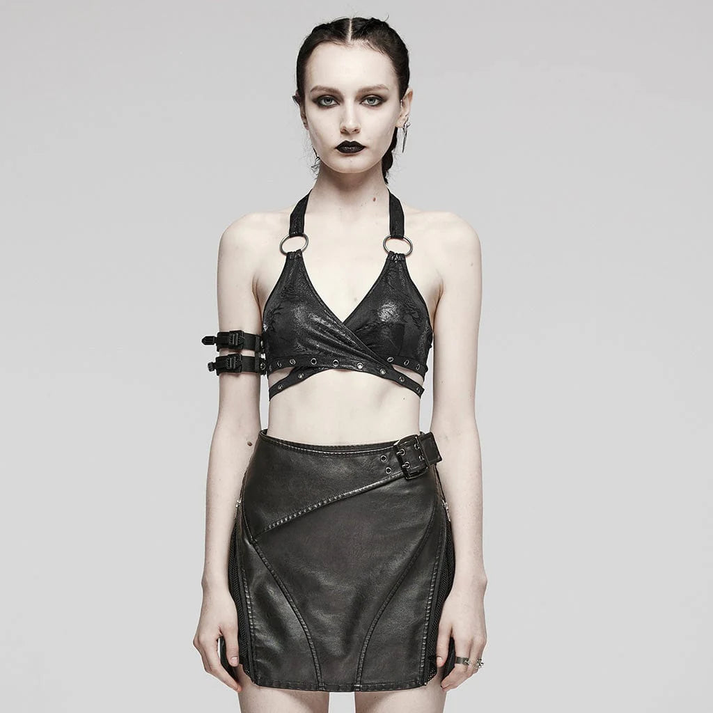 Model wearing Hexed wrap-up style top, showcasing adjustable straps and bold abstract black fabric.