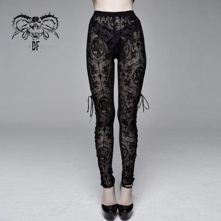 Showing the lace-up detail along the sides, sheer black brocade pattern, and elastic waistband.