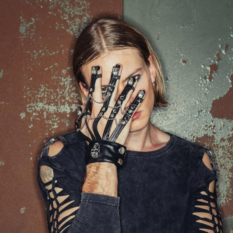 Front view of the Skull Crusher Gothic Men's Wrist Band, featuring black leather, studded skull details, and interconnected metal chains with finger extensions for a bold gothic look.