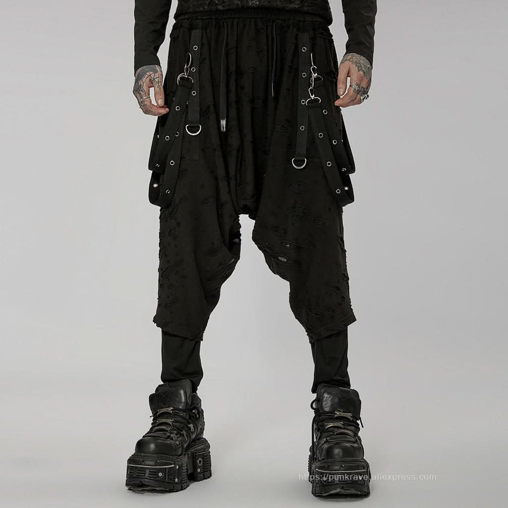 Full front view of model wearing punk pants with detachable belt accessories