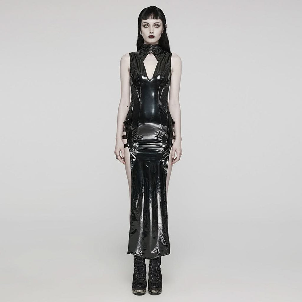 Model wearing the At Your Mercy Dress from Punk Rave, featuring a glossy black PU leather finish and harness-style front design.

