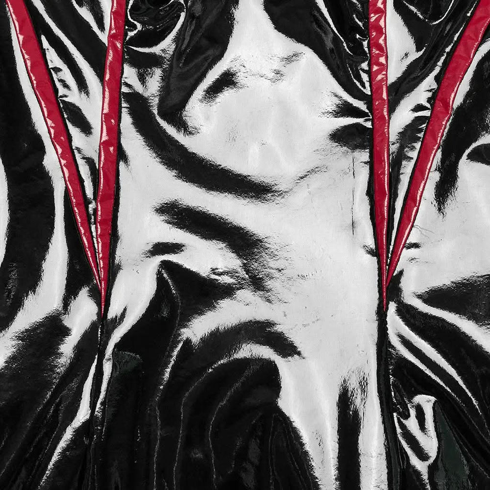 Close-up of the red patent leather accents, metal buckles, and strap detail for a bold punk look.