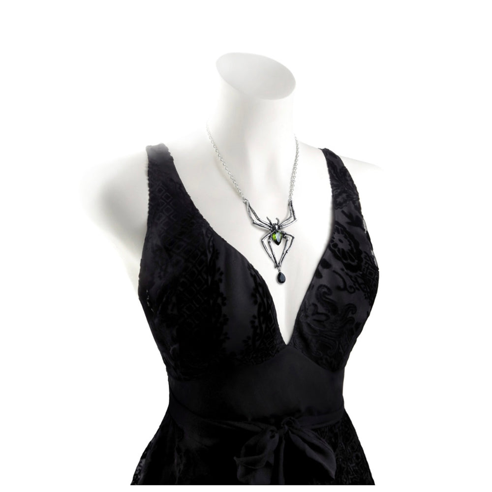 Gothic-style spider pendant with green and black crystals on a split chain.