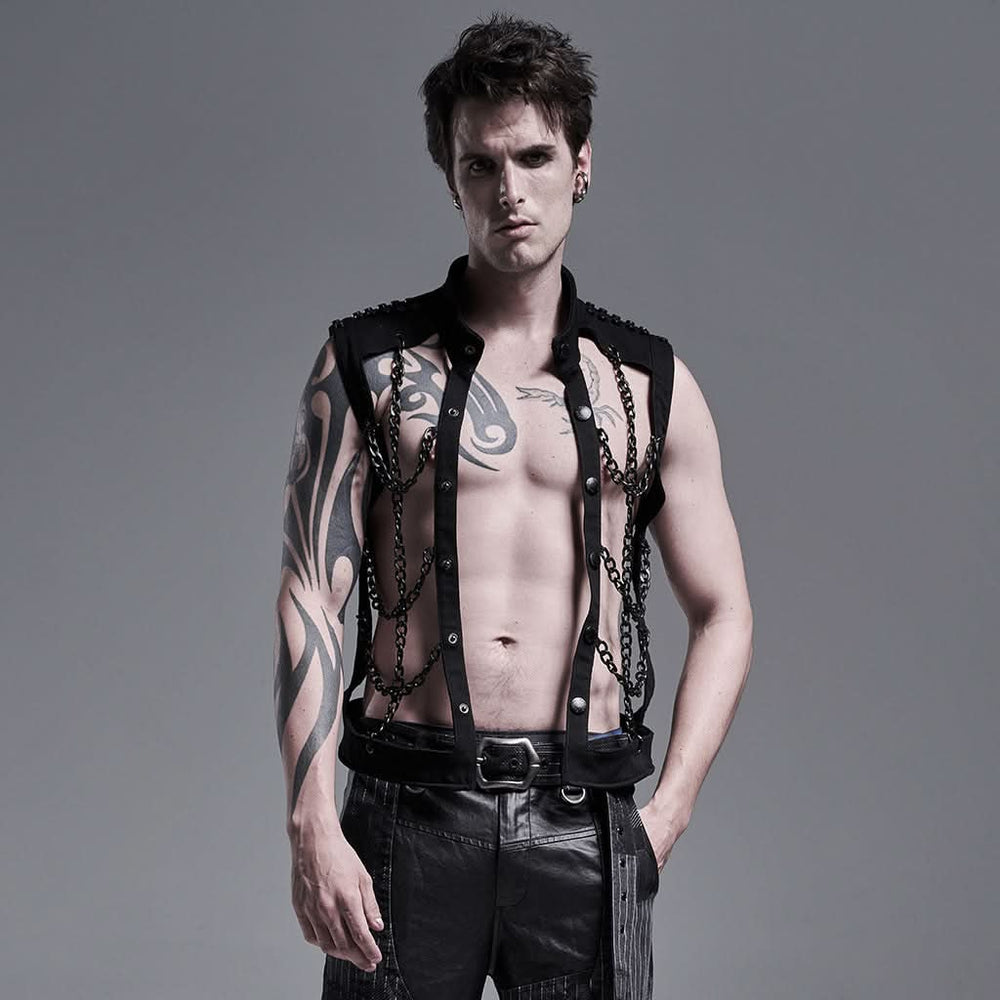 Model wearing the Consequences Await jacket, showcasing silver chains draped across the front and studded shoulders.

