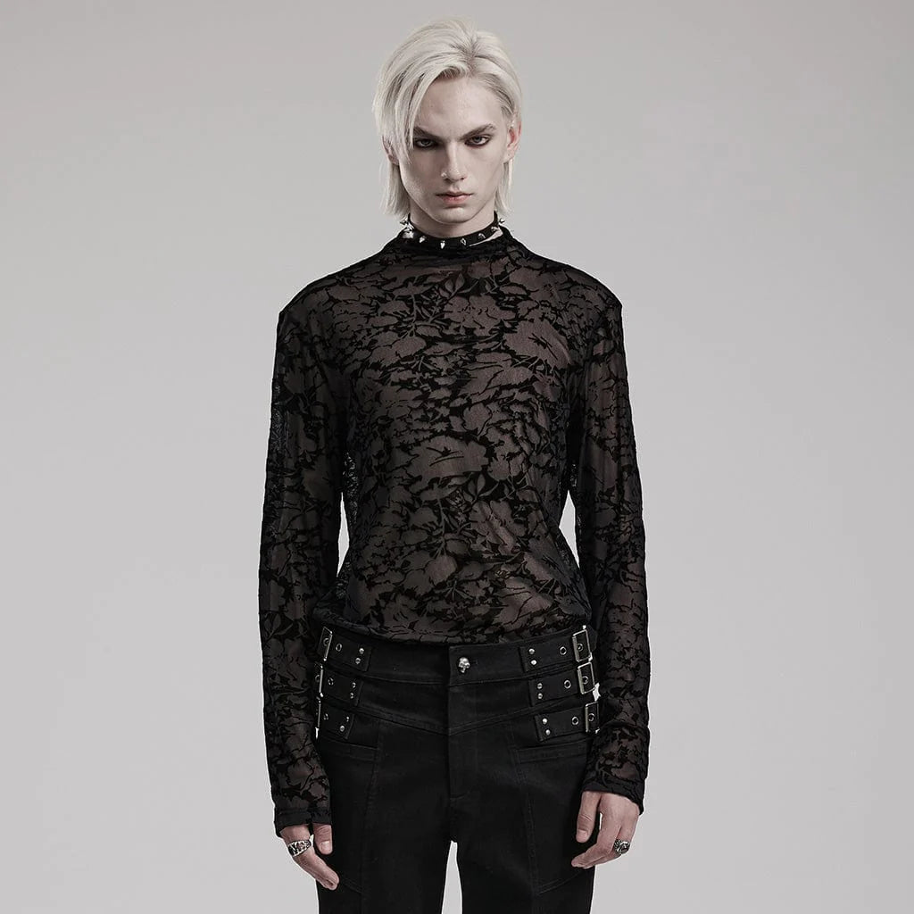 Model showcasing the Omen gothic men's top, a slim-fitted long-sleeve design with a high neckline, crafted from black mesh featuring a detailed floral print for a dark, sophisticated aesthetic.