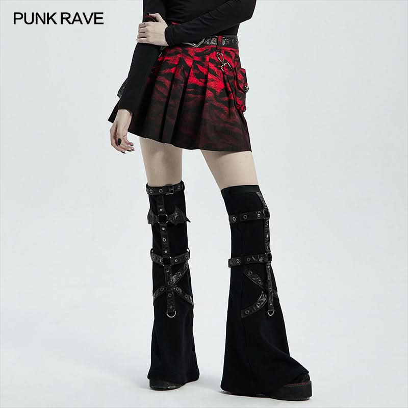 Model wearing the Paralyzed Skirt, highlighting the black and red gradient cotton fabric and pleated design.