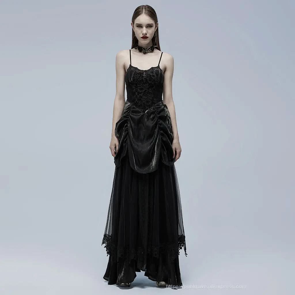 Full front view of model wearing black and gold gothic slip dress