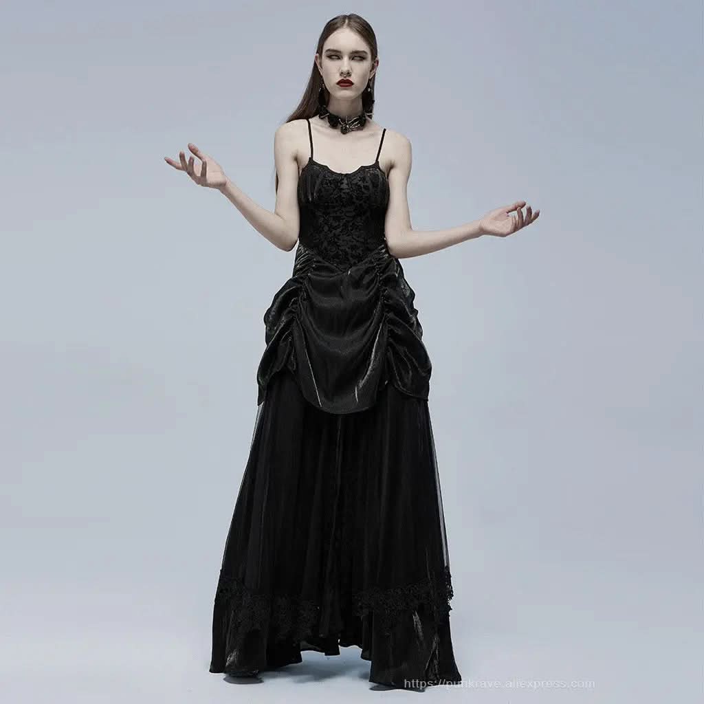 Model styling Black Widow gothic dress for a night out look

