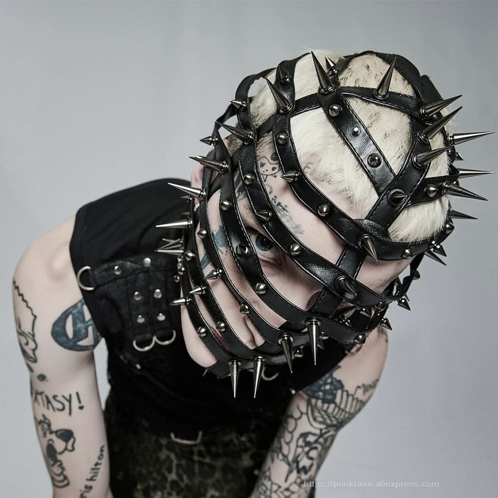 Side profile showing the sleek PU straps and bold alloy spikes on gothic face mask