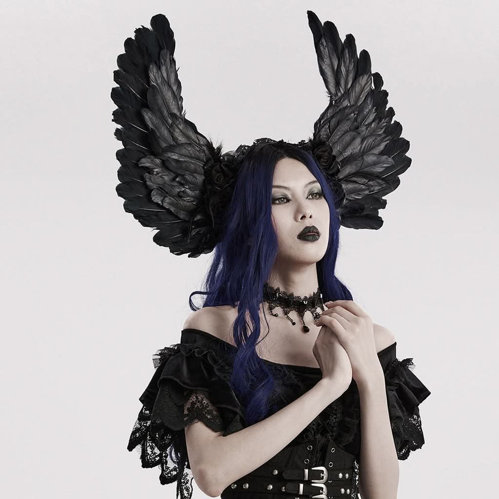 Side angle showing delicate ribbon roses and spiked details on gothic headpiece
